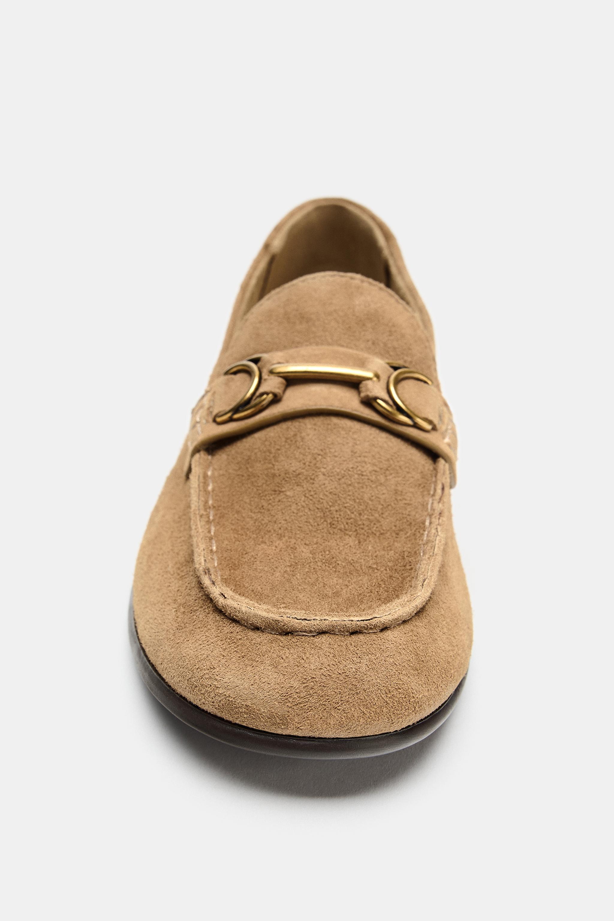 SUEDE LOAFERS WITH METALLIC APPLIQUÉ